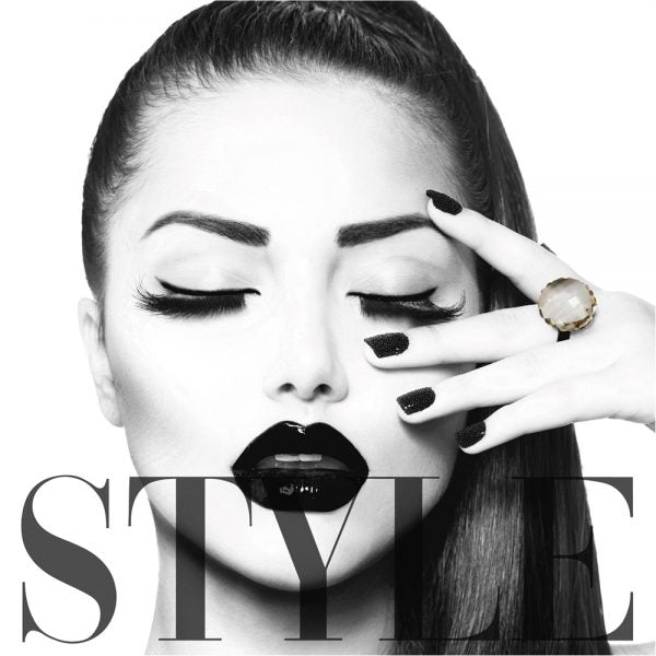 Black and white image of a woman with stylish makeup and a 'Style' magazine cover.